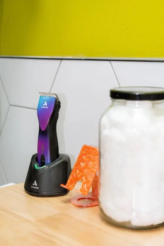 Clippers and supplies on the wood counter